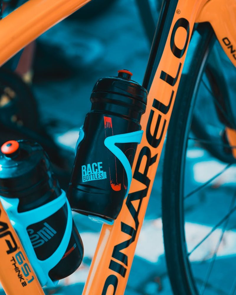 Detailed view of sports equipment and water bottle.